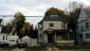 Front of house as seen across the screet smaller.JPG (66373 bytes)